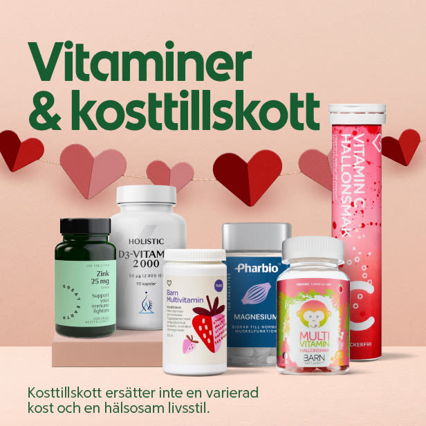Fem olika vitamin- och kosttillskottsflaskor står på en hylla med hjärtformade pappersdekorationer i bakgrunden.