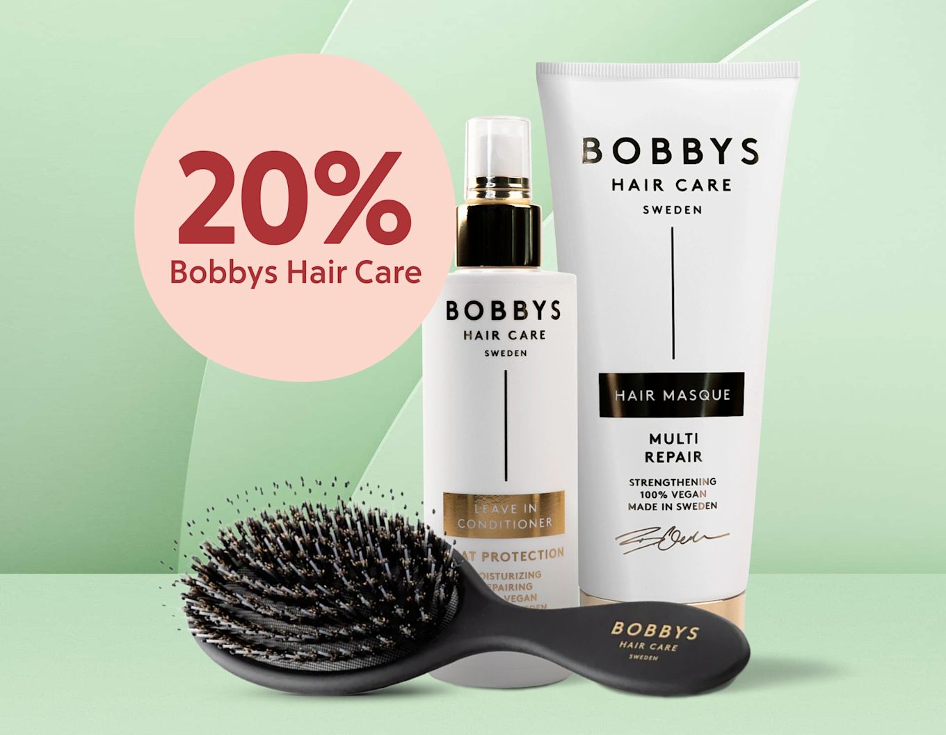 Rund rosa rabattcirkel med text "20% Bobbys Hair Care" bredvid vita Bobbys Hair Care-produkter och en svart hårborste mot mintgrön bakgrund.