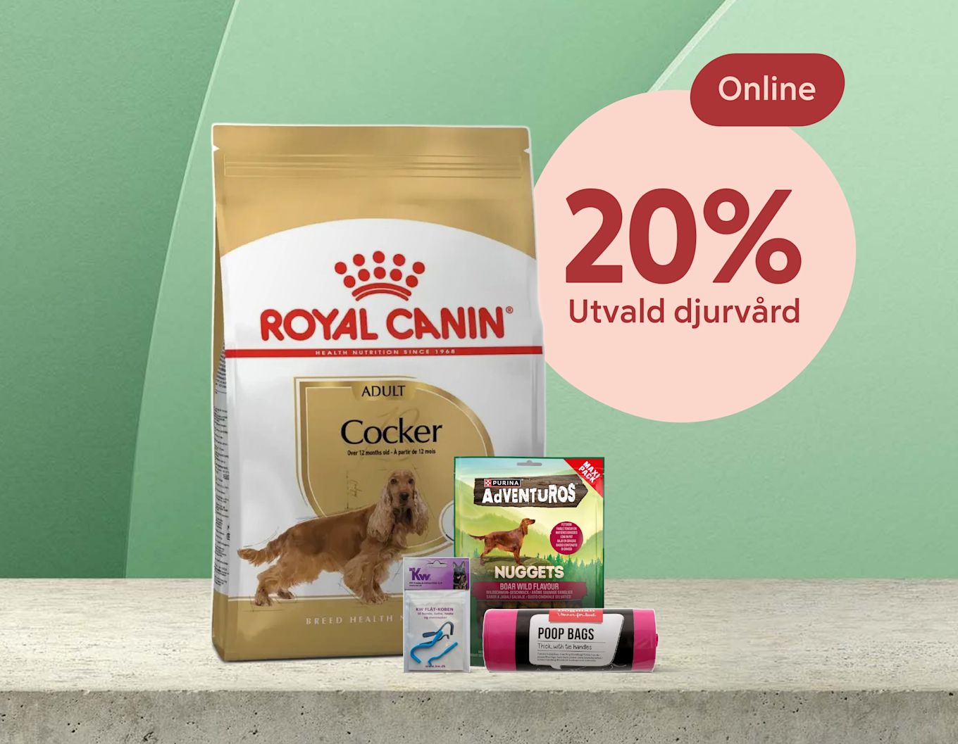 Stor påse Royal Canin hundfoder med en spanielbild, framför mindre hundprodukter och en rund rosa skylt med texten "20% Utvald djurvård".