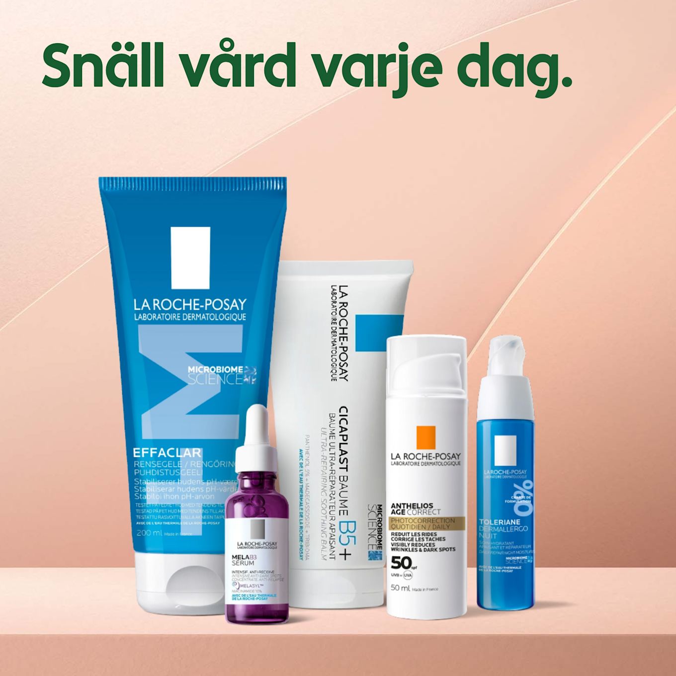 Fem La Roche-Posay hudvårdsprodukter i rad på en rosa hylla mot ljusrosa bakgrund, med texten "Snäll vård varje dag." till vänster.