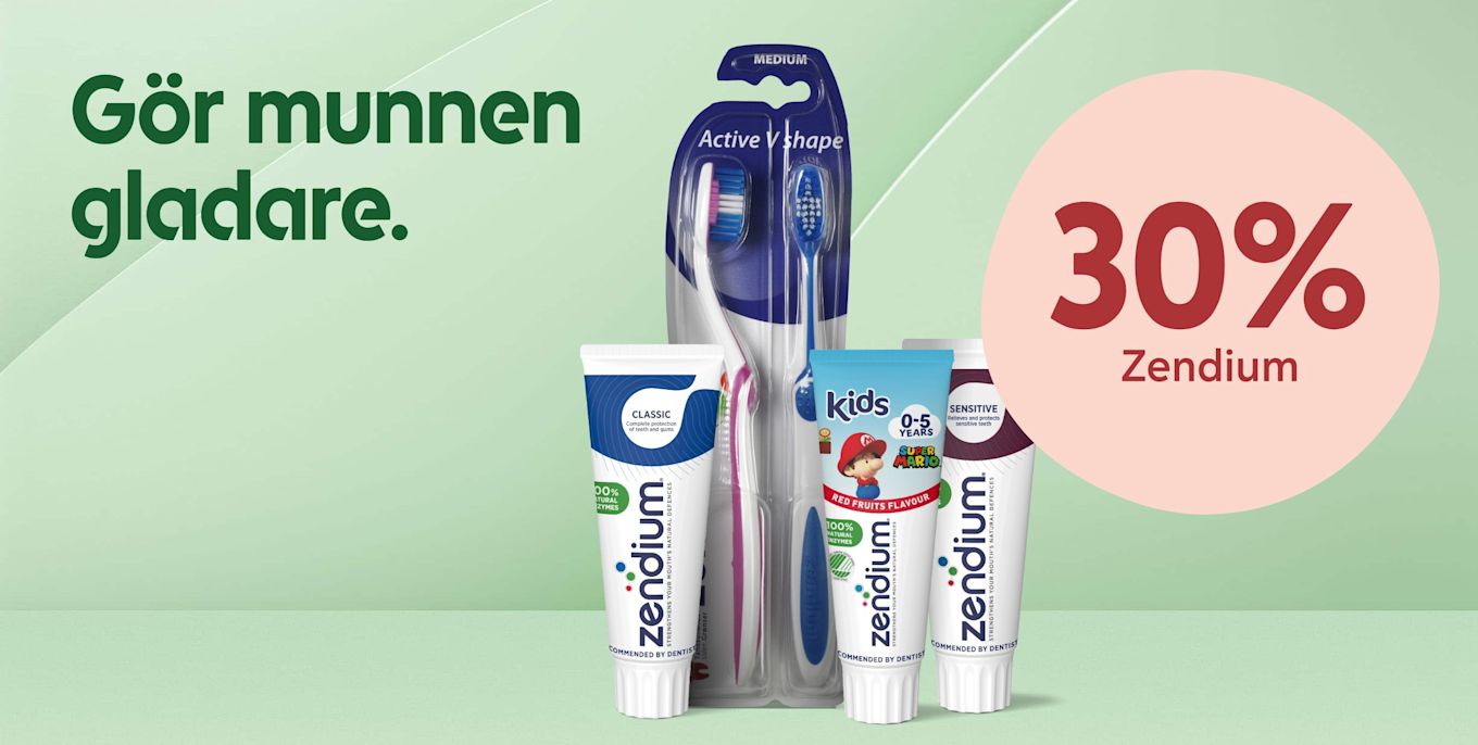 Flera Zendium-tandkrämstuber och två tandborstar i förpackning framför ljusgrön bakgrund, texten "Gör munnen gladare." till vänster och en rosa cirkel med "30% Zendium" till höger.