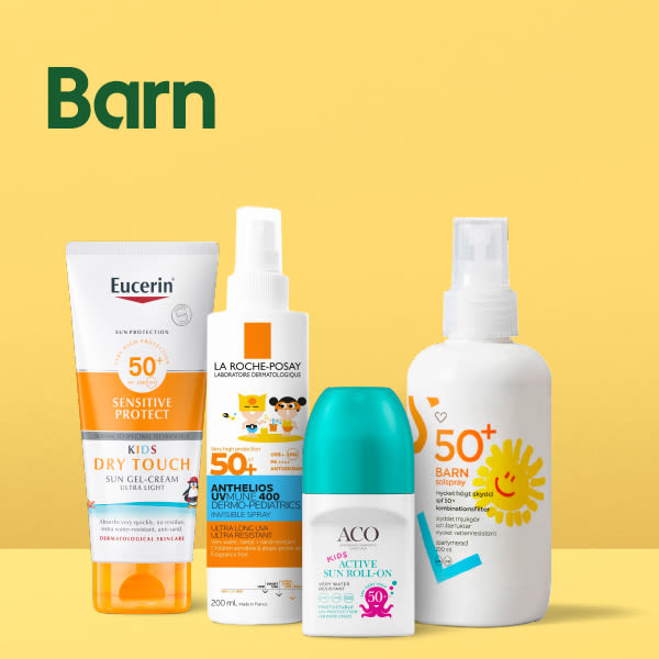Fyra olika solskyddsprodukter för barn med solskyddsfaktor 50+, placerade mot en gul bakgrund med texten "Barn" ovanför.