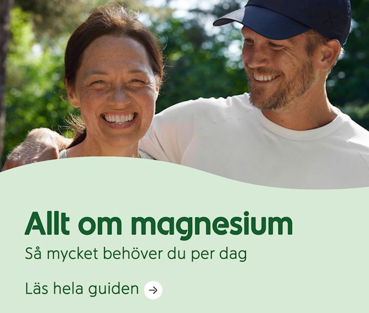 Ingång till en rådgivande artikel om magnesium. En man och en kvinna står utomhus och ler. Under dem står texten "Allt om magnesium - Så mycket behöver du per dag" och "Läs hela guiden".